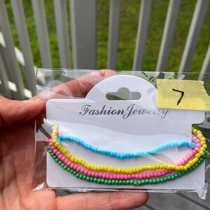 Set of 4 Stretchy anklets.  NWT.. handmade.